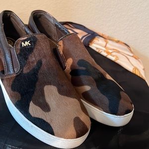 Michael Kors, tennis shoes with the army fatigue look